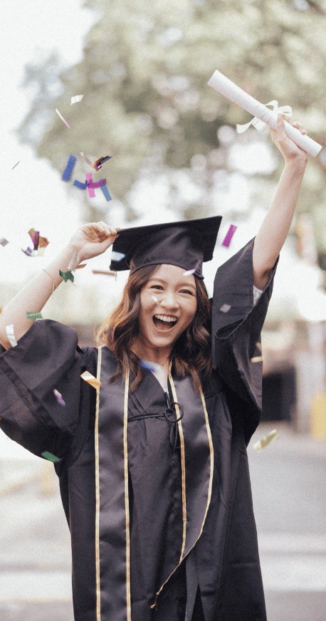 Successful University Graduate Raising Her Diploma
